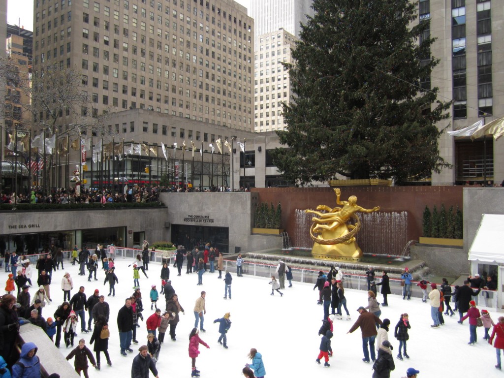 The ice-skating rink at Rockefeller Center, with the statue of Prometheus overlooking the rink