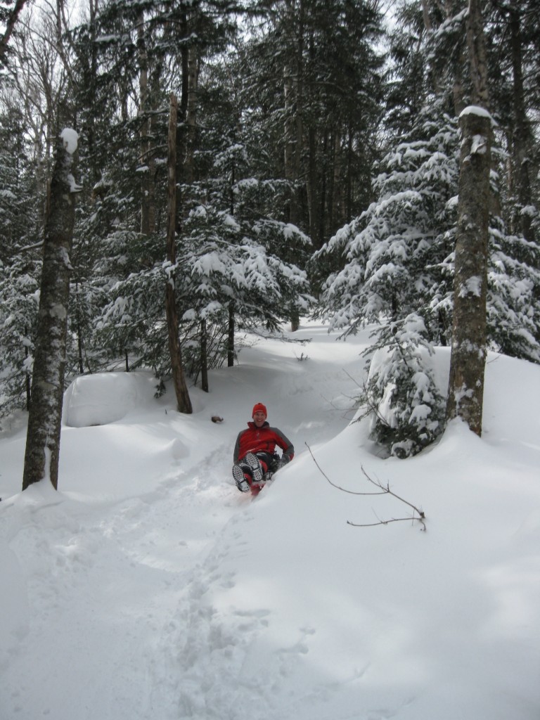 Hiking up the mountain, but sledding down! 
