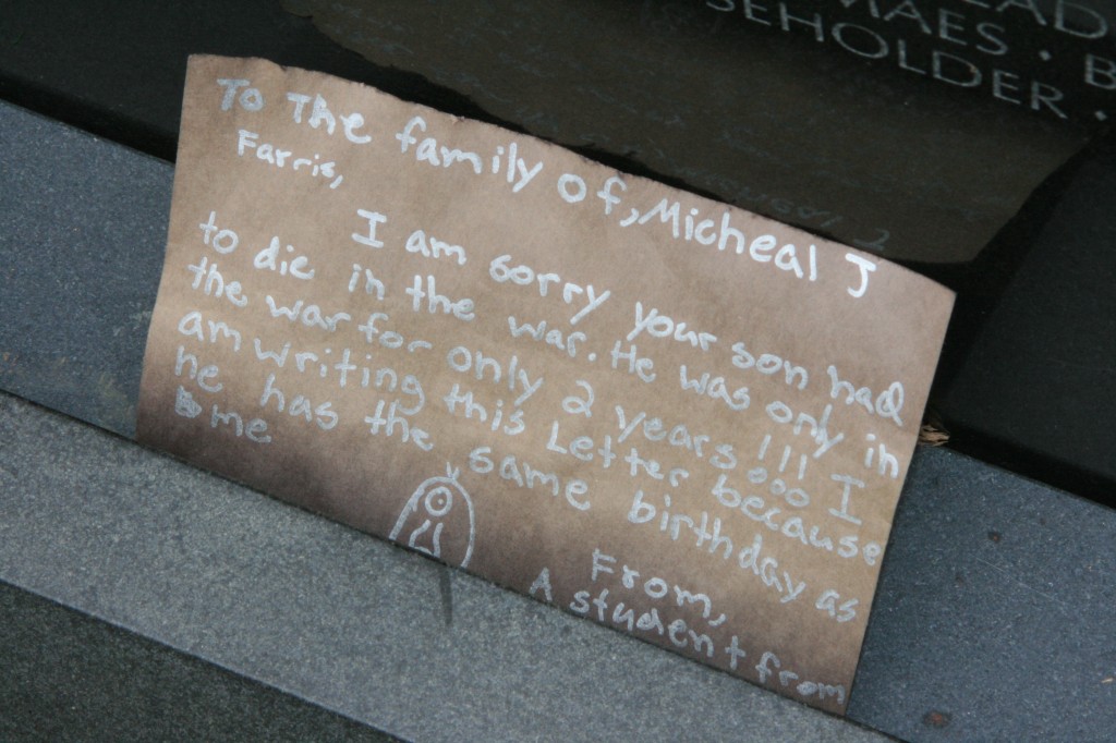 A message from a school-aged child to the family of Michael J., killed in action during the Vietnam War. The Vietnam War Memorial is always lined with flags, letters, photos, and other expressions of grief and gratitude to those who lost their lives in the war. 