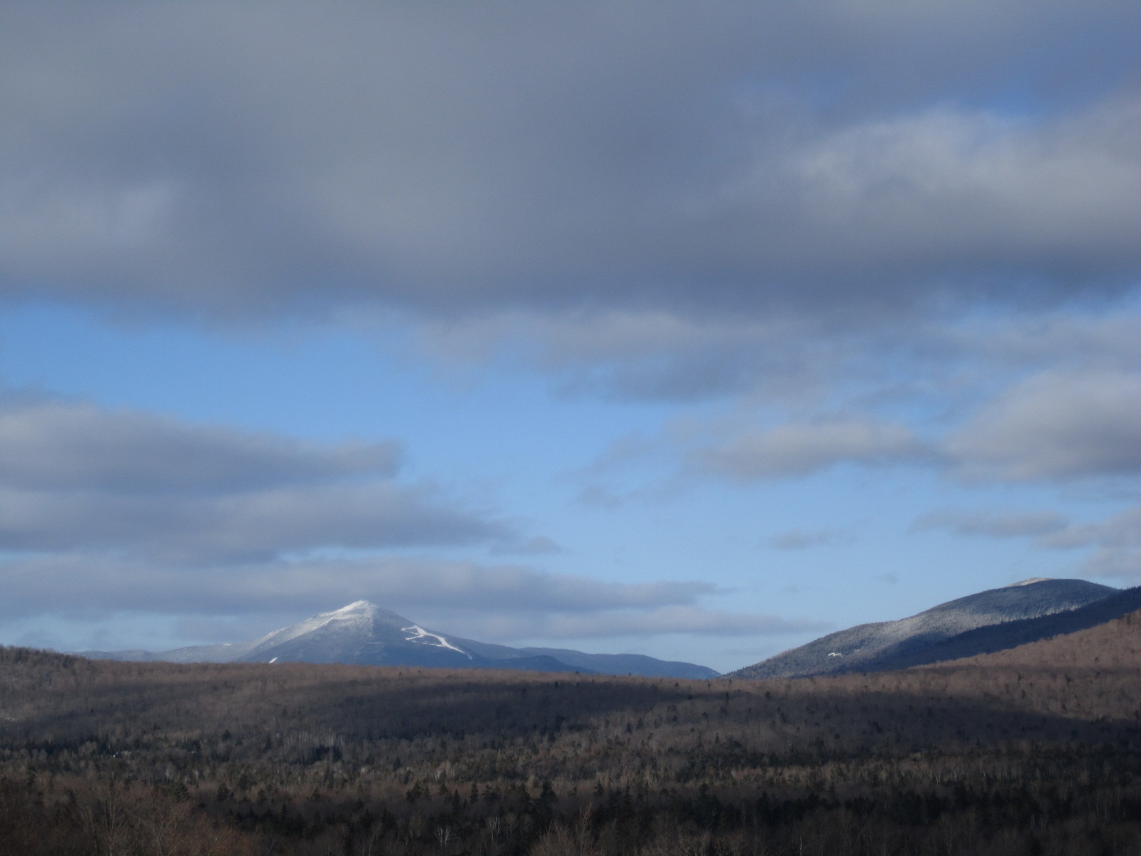 Beautiful view of Whiteface Mountain in New York's Adirondack mountains, as seen from the Bobsled track at Mt. Van Hoevenburg Sports Complex.